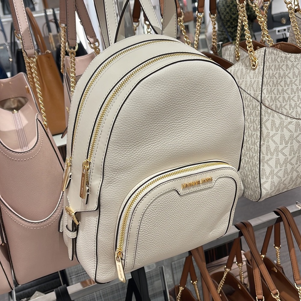Michael Kors Jaycee Medium Pebbled Leather Backpack
Light Cream - Picture 15 of 16